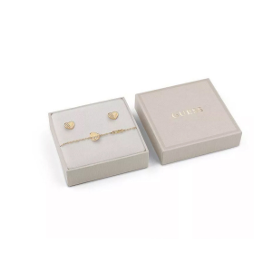 Guess - Parure acier doré, bracelet et boucles d'oreilles curs et oxyde de zirconium - Réf JUBS03187JWYGS